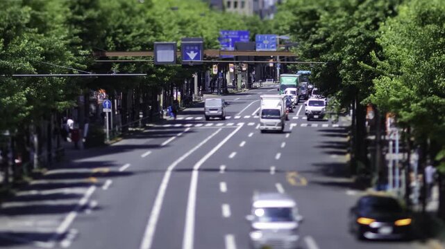 A timelapse of miniature traffic jam at the downtown street in Tokyo zoom