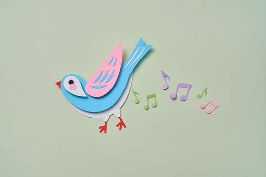 Paper spring craft bird sing with music note