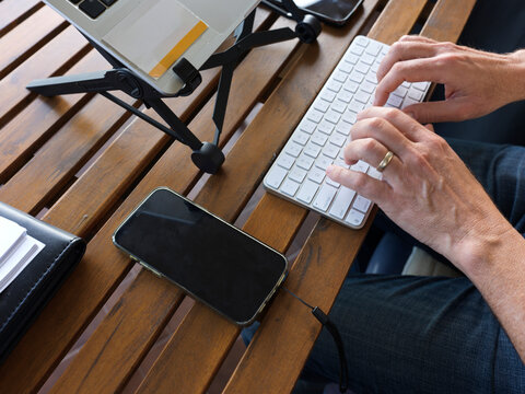 Working on a Laptop on Apartment Balcony at Home