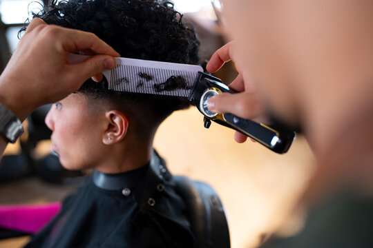 Hair cutting at a salon during the afternoon
