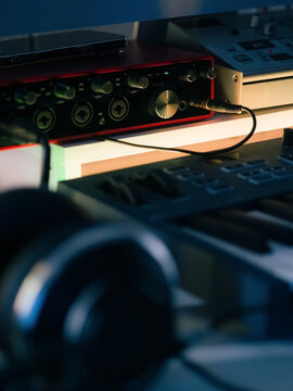 Musical Equipment Setup in a Studio During Evening Hours