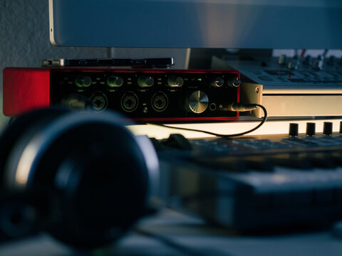Recording Equipment Placed on a Desk in a Music Studio Setup