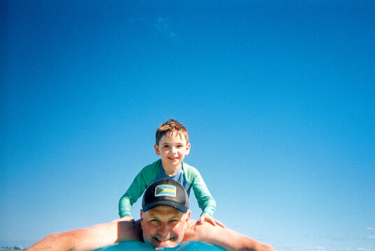 Fun happy swim portrait of family vacation in Bahamas
