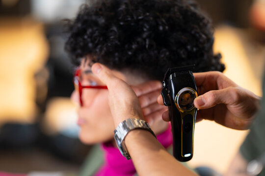 Barber Using Clipper for Precision Fade