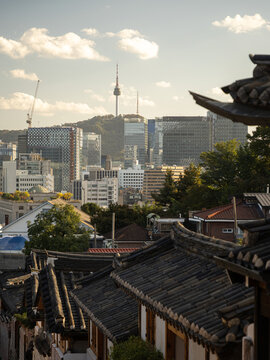 Seoul cityscape with N Seoul Tower and hanok village rooftops