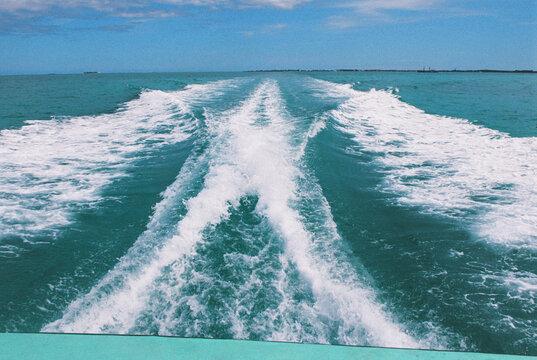 Wake of a boat in the Sea of Abaco, Bahamas
