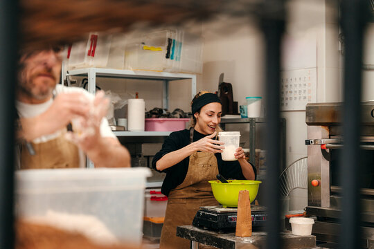 Bakers Prepare Ingredients in a Kitchen for Baking