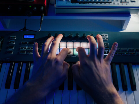 Man recording beats for new electronic music composition 