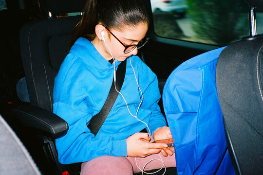 Girl Using Phone In Car