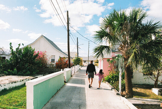 Family walking down the street in New Plymouth in the Bahamas