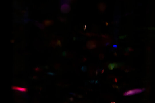 Abstract Colorful Bokeh Lights Overlay Effect on Dark Background