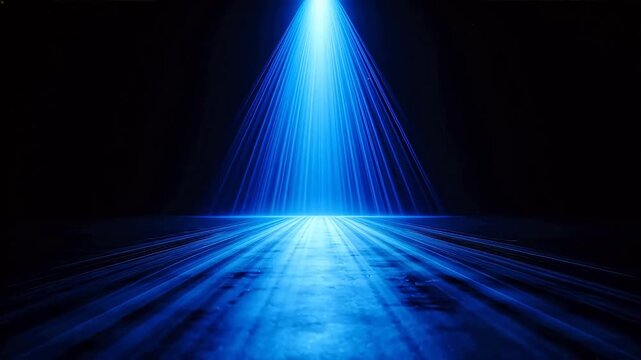 Blue light beams on dark surface