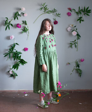 Woman standed full body surrounded by flowers 6