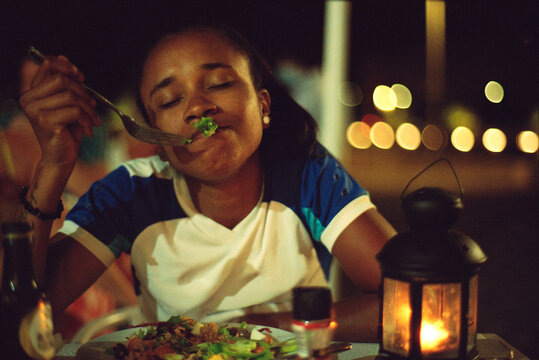 Eating Salad by Lantern