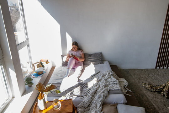 Young white woman have a rest at home
