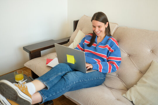 Casual Laptop Work Session on Couch
