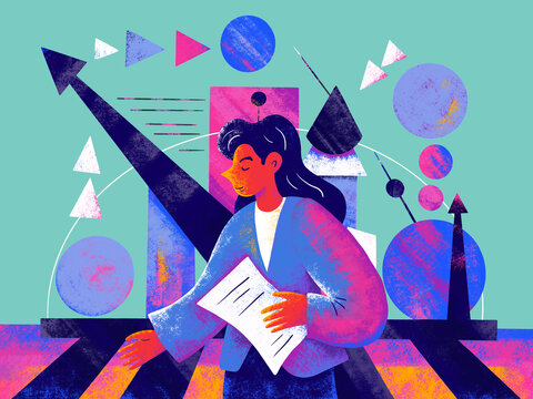 Person holds paper with geometric design elements