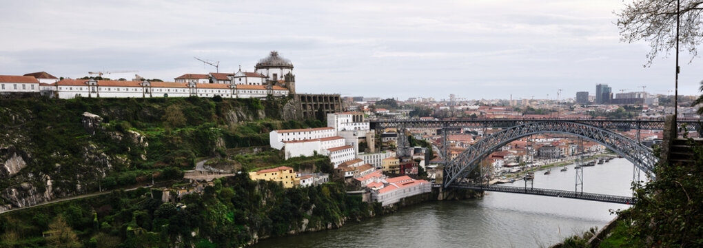 Porto panoramic cityscape featuring Douro River and Dom Luis I Bridge
