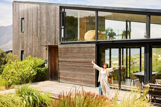 Woman enjoying her vacation house