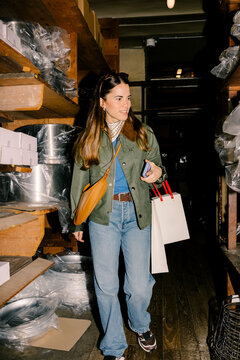 Tourist visiting a kitchenware market during her vacation in Paris