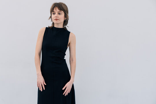 Studio Portrait Black Dress White Wall Side Gaze