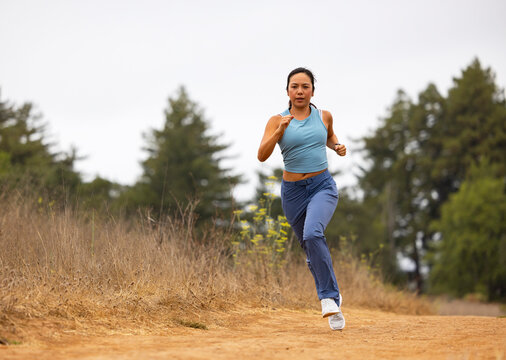 Asian fitness athlete Lifestyle running outdoors alone