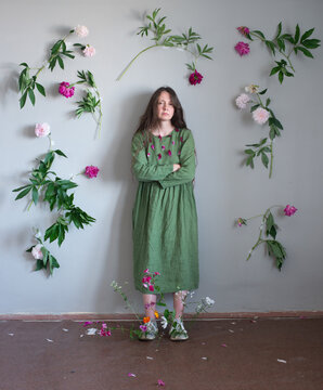 Woman standed full body surrounded by flowers 12
