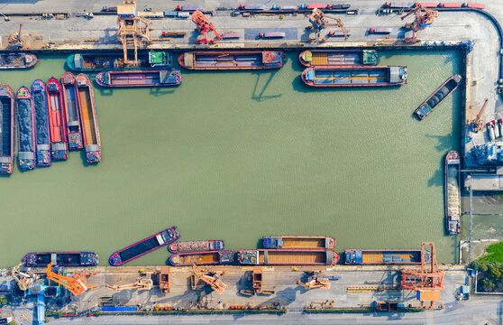 Aerial view of steel plant pier and cargo barges