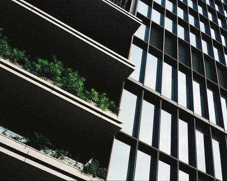 Modern building with balconies and glass windows
