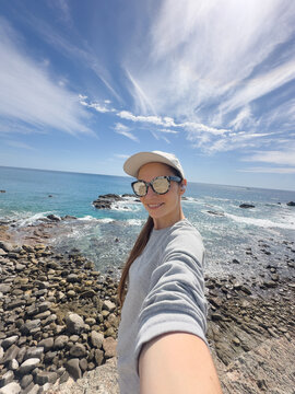 ugc selfie of female on a cliff