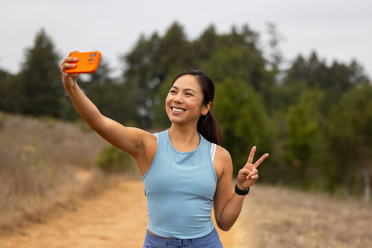 Asian fitness smile selfie mobile phone Portrait 