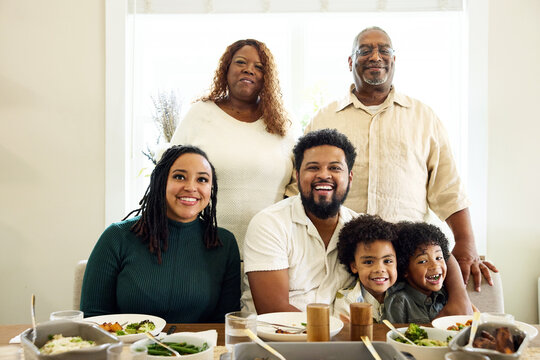 Family Gathered Together for a Meal at Home