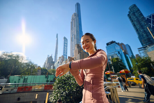 Happy athlete woman in New York City