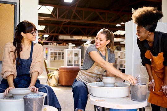 Friends Making Pottery in a Studio
