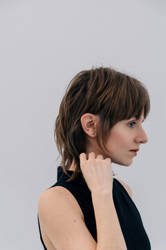 Minimal beauty portrait woman with short haircut profile view 