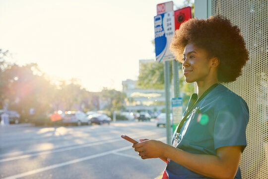 Nurse at Sunny Bus Stop
