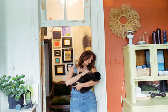 A woman spends time in her furniture restoration studio