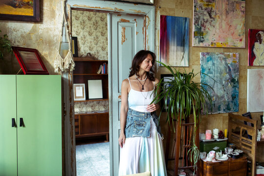 A woman spends time in her furniture restoration studio