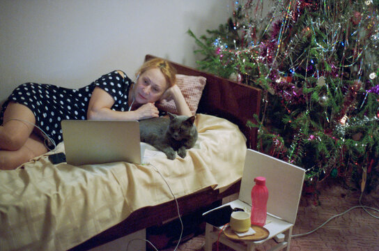 Woman and Cat on Bed