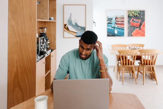 Entrepreneur working hard in a home office setting