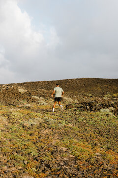 Professional runner training on a cross-country trail