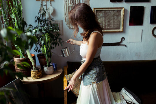 A woman spends time in her furniture restoration studio
