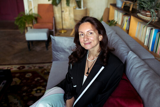 A woman spends time in her furniture restoration studio