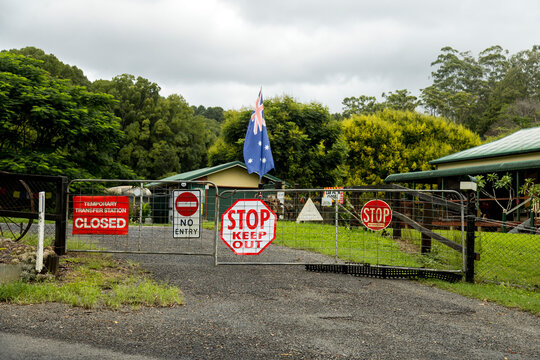Gate covered with stop and no entry signs in Australia
