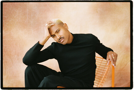 Stylish man with mustache in studio