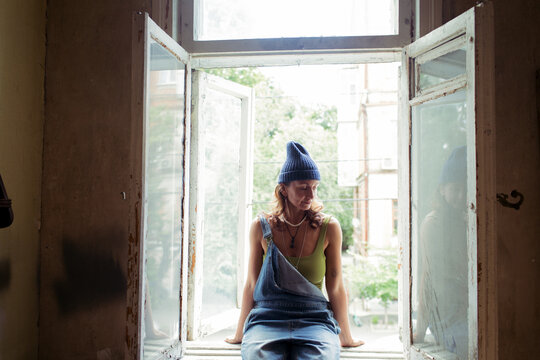 woman restoring furniture