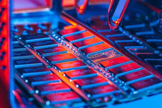 Closeup view of colorful computer memory modules installed inside a modern electronic device motherboard