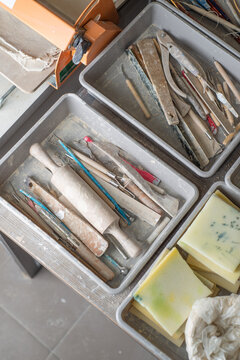 Tools for working with clay and modeling in a pottery studio