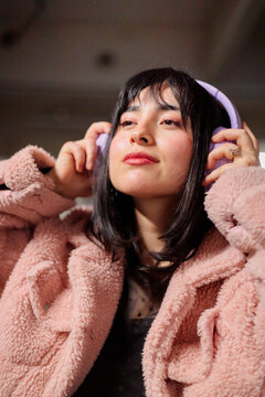 Woman Listening to Music With Headphones