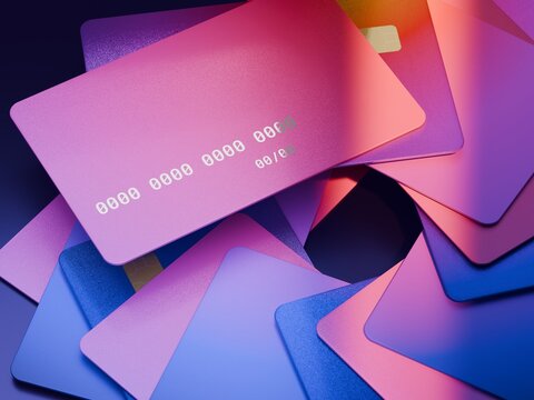 Multiple Payment Cards Arranged in a Colorful Pattern on a Surface
